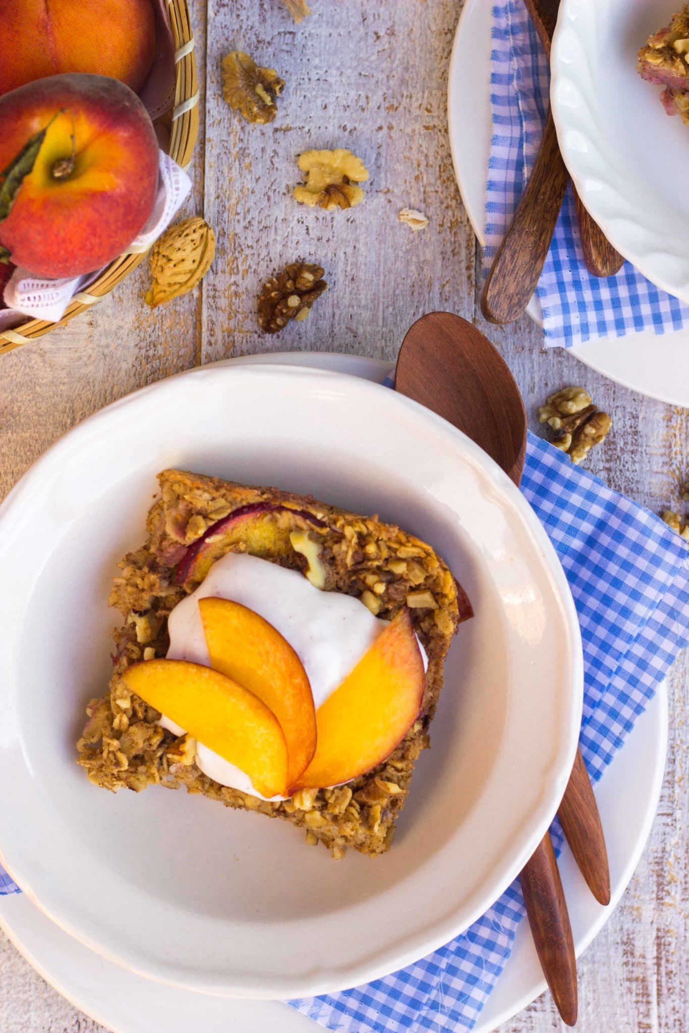 https://www.shelikesfood.com/wp-content/uploads/2014/06/Peach-Oatmeal-Bake-with-Whipped-Coconut-Cream-8996-scaled.jpg