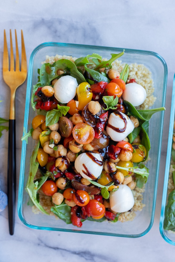 vegetarian caprese meal prep lunch bowls with a fork